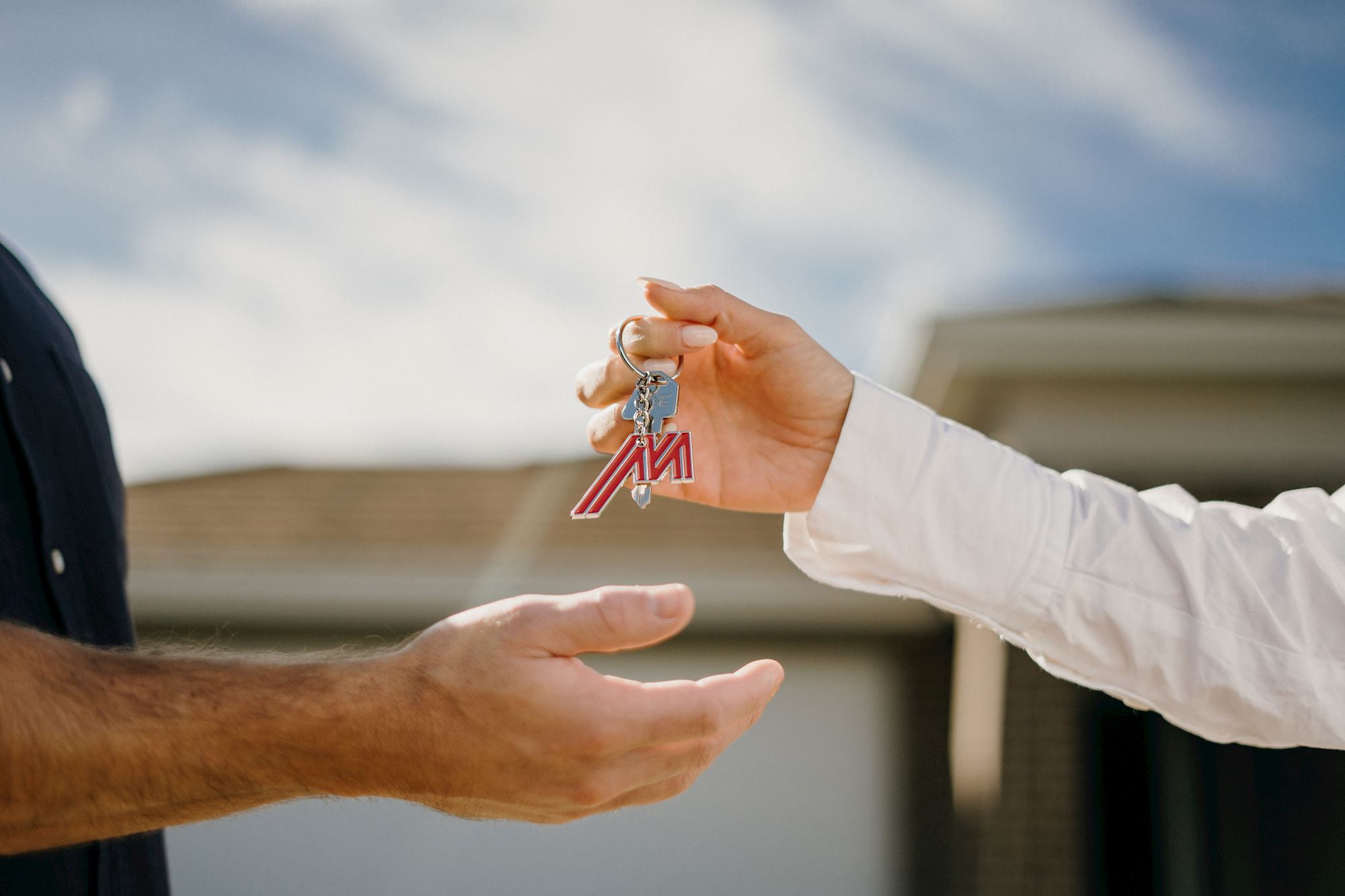 Hands holding keys